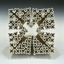 Organic-looking ceramic sculpture based on a crosses fractal, third view.