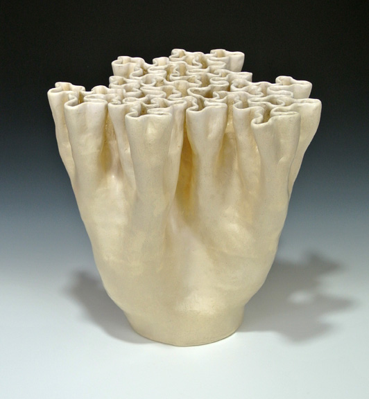 Organic-looking ceramic sculpture based on a fractal curve first view.
