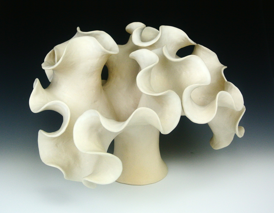 Organic-looking ceramic sculpture based on a the Sierpinski Arrowhead fractal curve, first view.