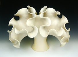 Organic-looking ceramic sculpture based on a the Sierpinski Arrowhead fractal curve, third view.