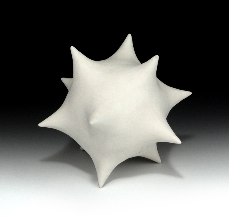 Abstract ceramic sculpture of a spiky polyhedral form with icosahedral symmetry.