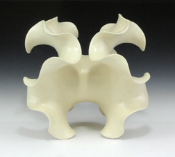 Negative-curvature abstract ceramic sculpture based on a two-fold saddle surface.