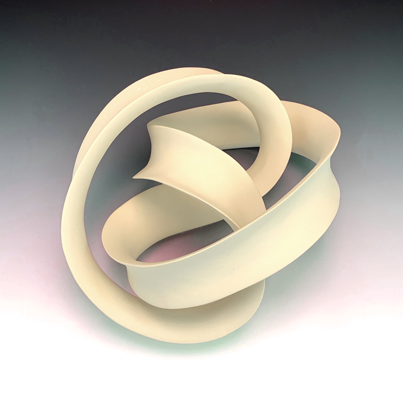 Ceramic sculpture of a trefoil knot.