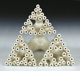 Organic-looking ceramic sculpture based on a fractal tree Sierpinski triangle, third view.